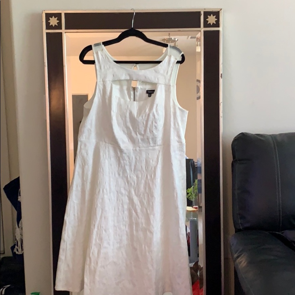 Beautiful A-line white, below the knee, dress